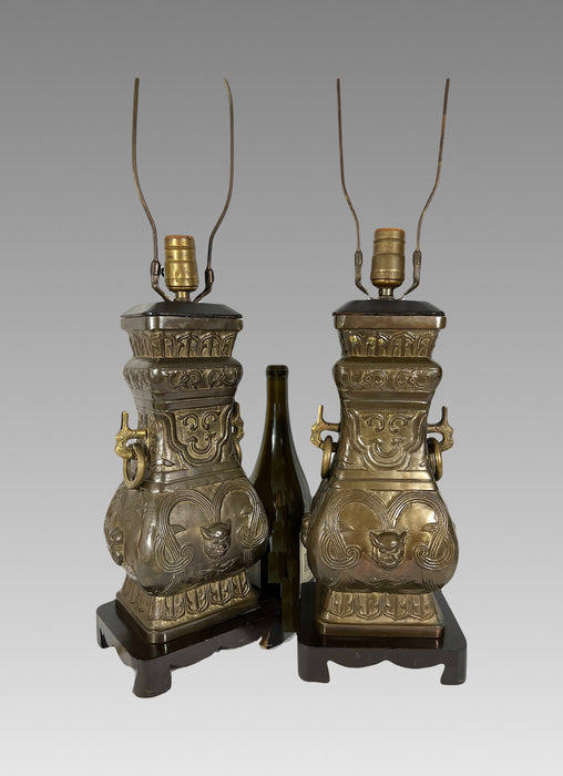 Archaic Chinese 'Hu' Form Verdigris Bronze Table Lamps on Chinoiserie Wood Stands, a Pair