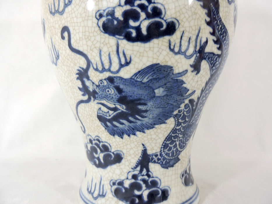 Mid 20th Century Chinese Blue and Antique White Crackle Glazed Vase With Double Cloud Dragons